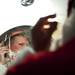 Ann Arbor Santa Claus Danny Maier looks in a mirror to adjust his beard on Sunday. Daniel Brenner I AnnArbor.com